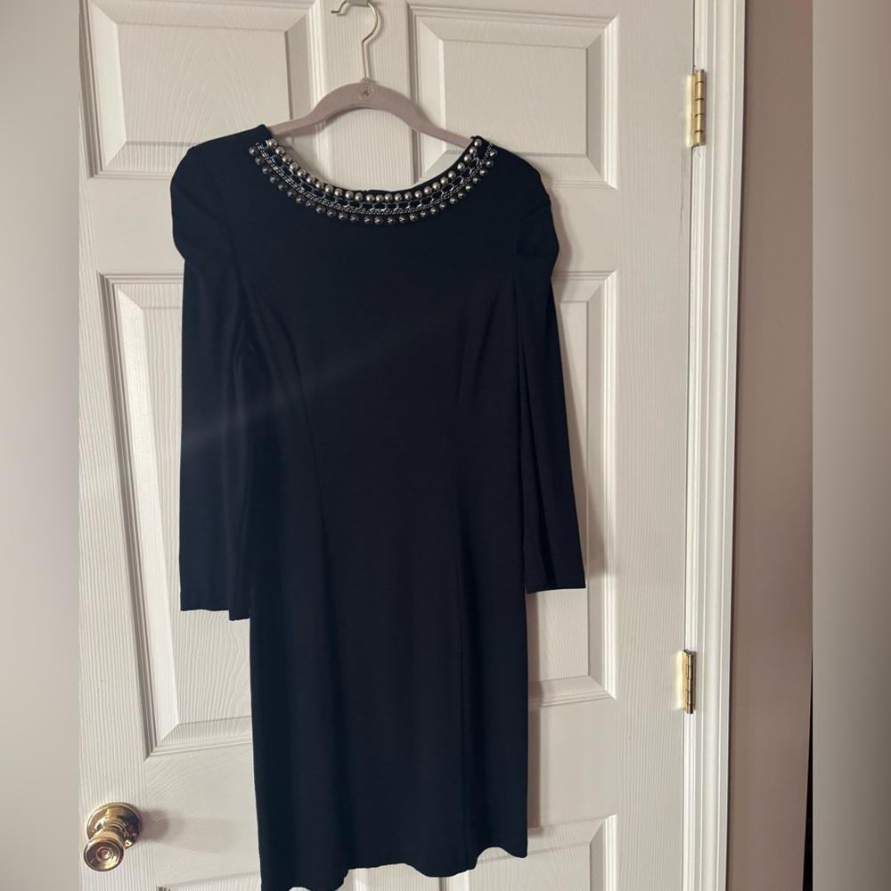 Elegant Black Dress with Embellished Neckline